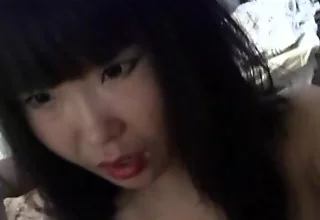 Asian teen baby rubbing her wet pussy as she masturbates
