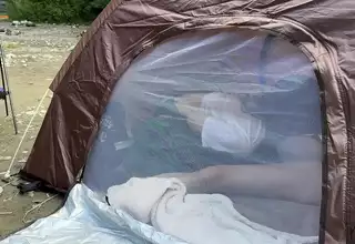 Camping Amateur college girl gives blowjob and sex in a tent while trying to hold back her voice so no one will notice during outdoor exposure camping
