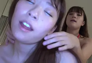 A lingerie lesbian threesome includes a rimjob performed in Japanese. The intimate act occurs within this multi-person scenario.