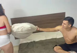 What begins as pillow game quickly transforms into passionate fucking that ends with a creampie. The amateur couple's Spanish-language encounter maintains an authentic feel.